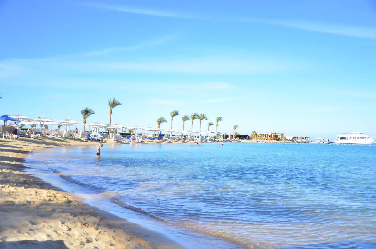 Eagles paradise abu soma resort 4 хургада. Swiss Inn Hurghada 5*. Swiss Inn Resort Hurghada 5* пляж.