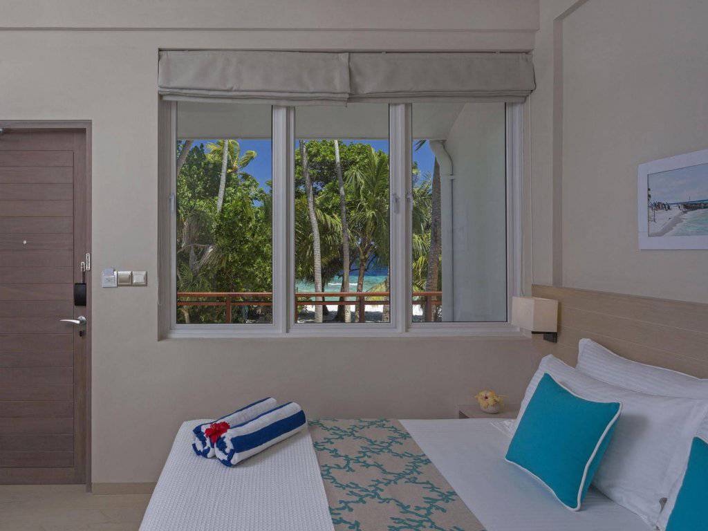 Malahini kuda Bandos Resort 4 Мальдивы